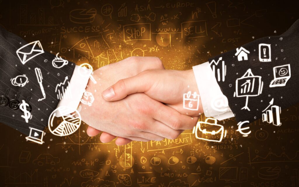 Businessmen handshake concept, with icons on image for mailing, a house, a dollar sign and suitcase.